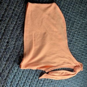 over the shoulder cropped pink shirt